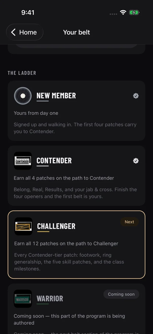 The ladder in the member's app says what each belt takes. Belts that aren't ready show "Coming soon".